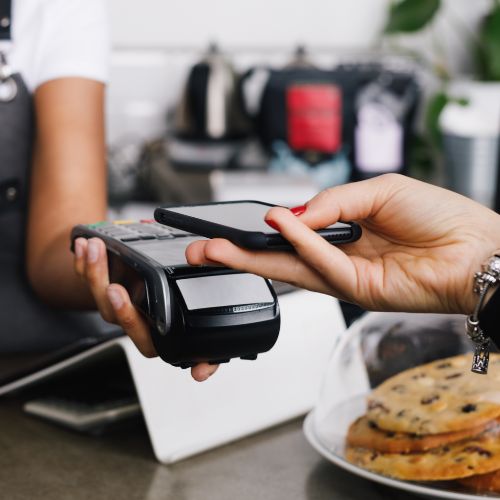 Customer paying with contactless payment